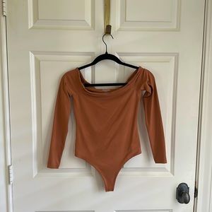 Nuuds off shoulder bodysuit. size x small.